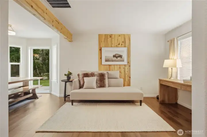 Small family room or gathering area on main level, just to right of entry.