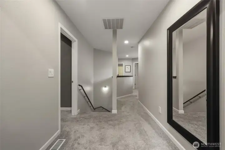 Upper level hallway ... did I mention all the carpet is brand new??  Actually the entire home feels brand new!