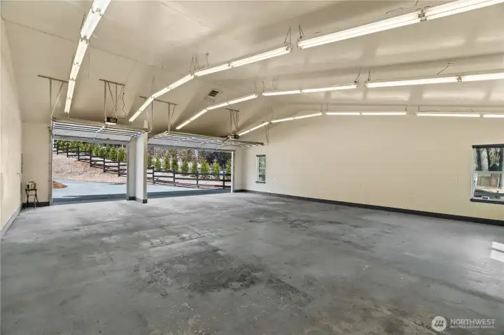 You are going to love this detached shop. Tall ceilings, tons of light, and space for whatever you envision.