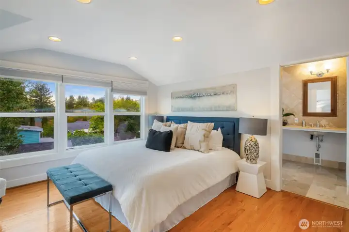 Primary suite is spacious and bright