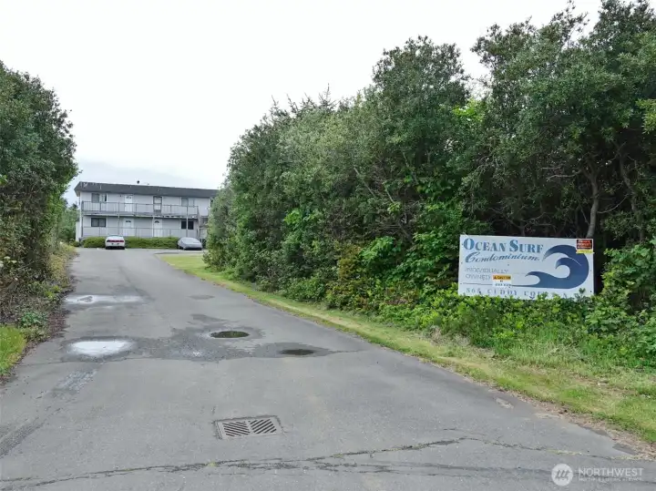Driveway entrance to the Ocean Surf Condo Building. Tucked-away in a cul-de-sac, yet minutes to the Beach access and downtown Ocean Shores.