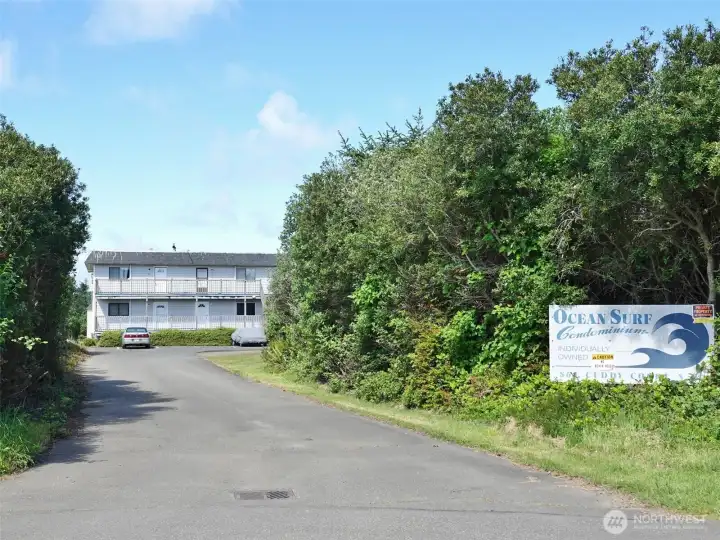 Driveway entrance to the Ocean Surf Condo Building. Tucked-away in a cul-de-sac, yet minutes to the Beach access and downtown Ocean Shores.