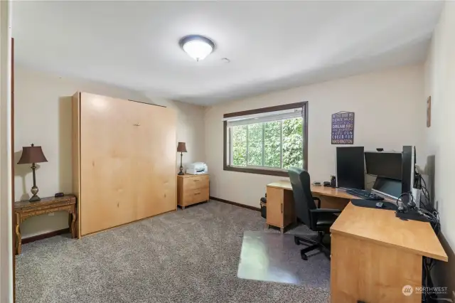 Main Level Bedroom.   Murphy Bed stays.