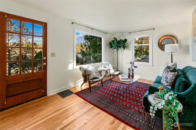 Once inside you are greeted with newly restored and refinished original oak floors.