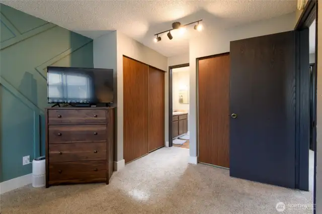 The Primary Suite enjoys dual closets and a connected full bath for convenience.