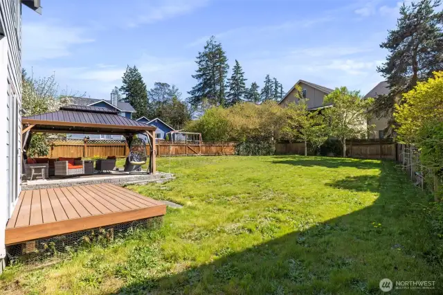 Big enough yard for play, pups and BBQs!