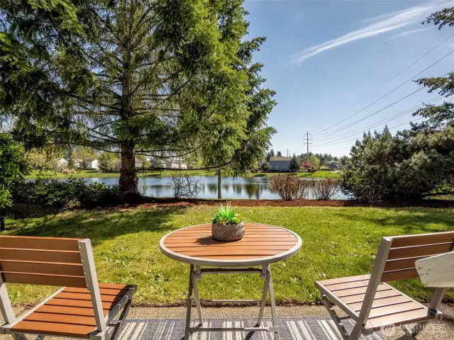 Just outside the slider is a patio where you can sit and view the lake. Can you imagine sitting here?