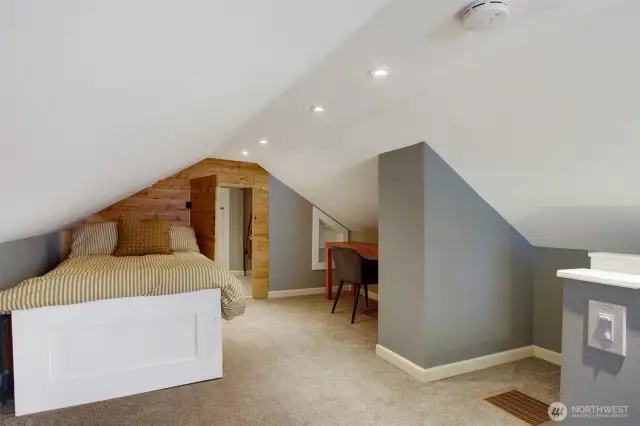A finished closet and a very large unfinished storage area are just beyond that door. See virtual tour dollhouse for photos.