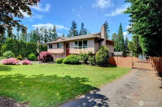 Deep & Wide - front withdriveways planking both sides of house.
