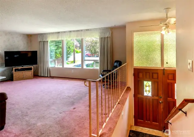 Living Rm on main floor. Beautiful wood door entry