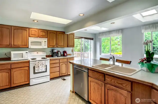 Notice all the windows and skylights .  Natural Lighting.