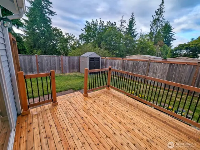 Enjoy your quiet and private back yard on a greenbelt with new deck and shed!