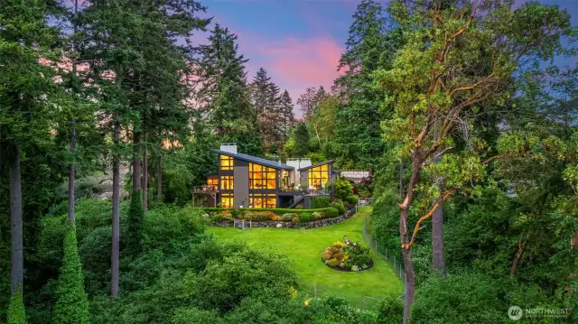 Framed by native forest and bathed in sunset light, this architectural estate offers over 5,000 square feet of modern luxury, complete privacy, and panoramic views of Carr Inlet. A statement home surrounded by nature, designed for those who expect more.