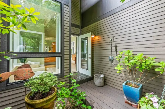 Accessible from the bath, this unique and luxurious outdoor shower atrium is a retreat within a retreat.