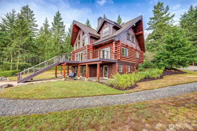 East-side view of stunning 4 BR home.