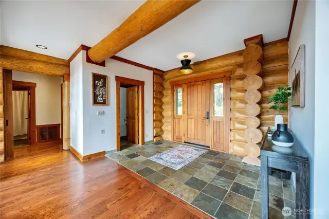 Powder room off entry for guests.