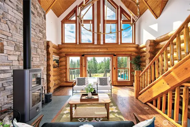 Walls of windows flood the home with light.