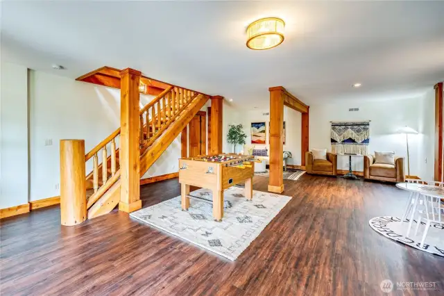 Lower Great room ready for guests with French doors out to lower patio and swimming pool.