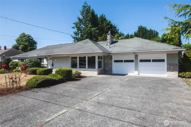 Home sits back from the street and has plenty of parking.