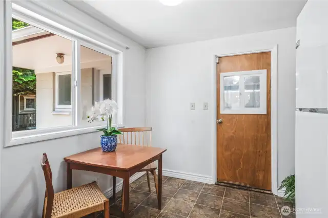 Kitchen eat-in dining space, with door to the garage.