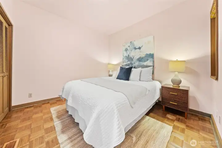 Bedroom Three: Comfortable and versatile, featuring ample closet space and a warm, inviting atmosphere—perfect for rest, work, or play.