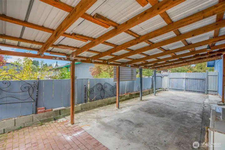 Side port. Gate does open up for cars.