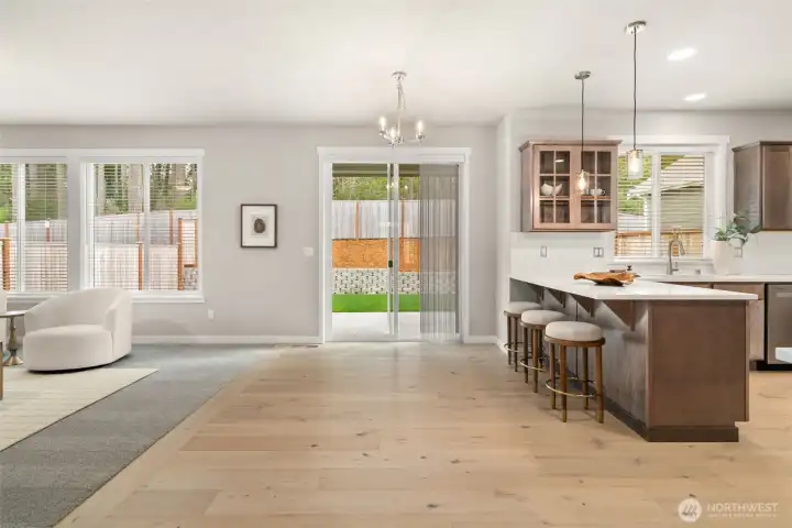 Nook area with sliding door leading to backyard and patio. Nook area with sliding door leading to backyard and patio.