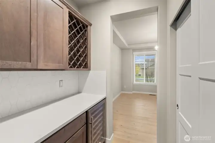 Butler's pantry with wine fridge.