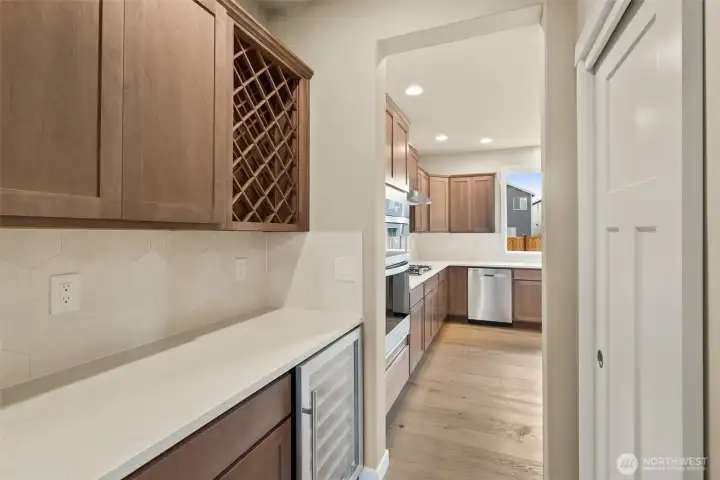 Butler's pantry with wine fridge.