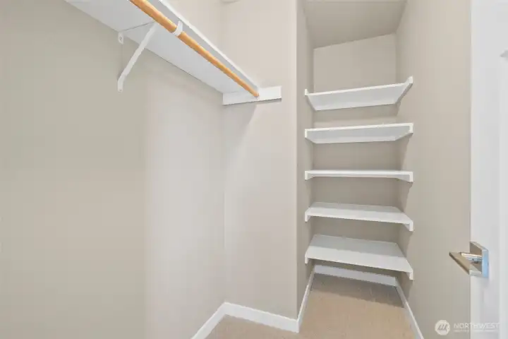 Bed #2 closet/ Solid shelving in all closets Bed #2 closet/ Solid shelving in all closets