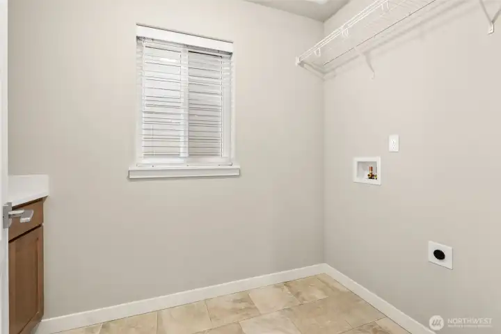 Laundry room located upstairs for convenience.