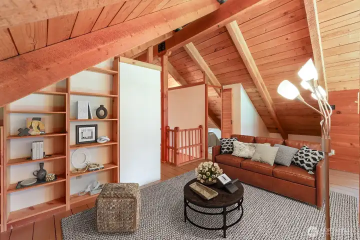 Enjoy the flexibility of a second-story loft—ideal for hobbies, entertainment, or a cozy guest retreat. Split the space with a designated pull out sofa and still have room for seating on the other side, you decide! Virtually staged to showcase possibilities.