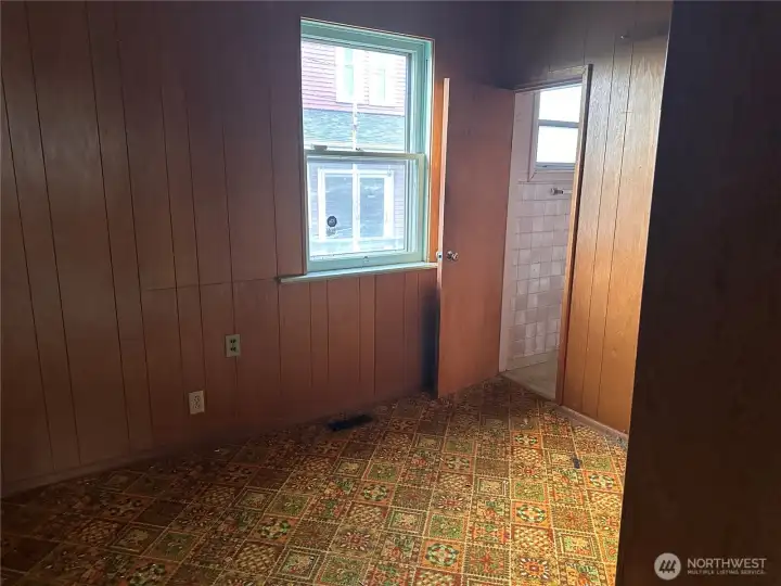 downstairs bonus room with stairs to upstairs