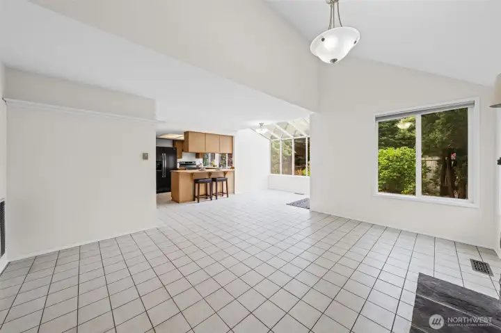 Large 2nd front room with dining space and door that leads to back yard.