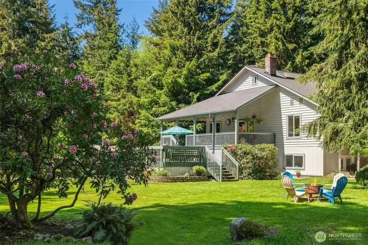 Welcome to this lovely home on almost five, well-drained, level acres of gorgeous Vashon Island property.