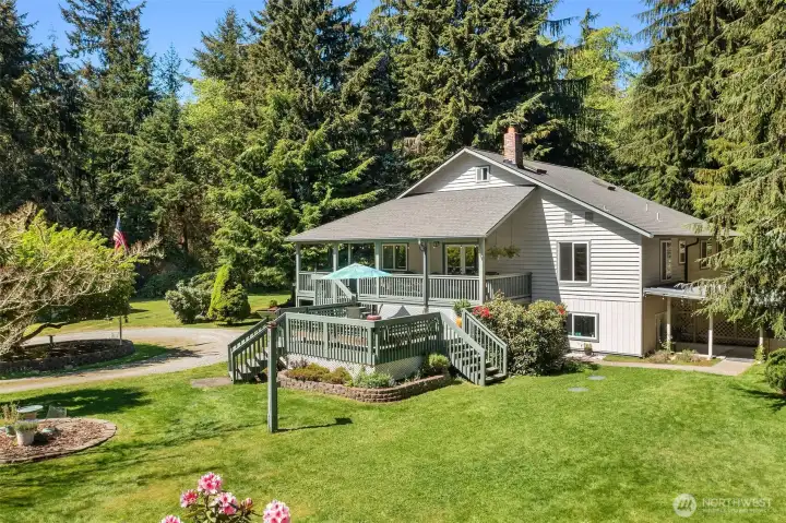 One-owner home, custom built home. The two-tier decks allow for enjoying the outdoors rain or shine!