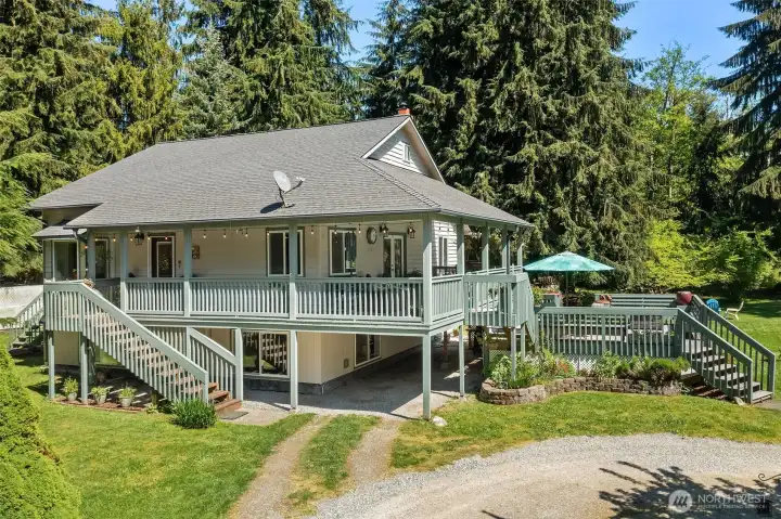 Entry deck wraps around with French doors leading out from the living room for such easy access.