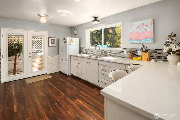Ground level space has its own entrance on the east side of the home.