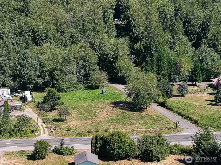 Corner lot with 12 more attached acres to explore.