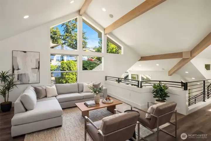 Upstairs, a loft/office offers a delightful surprise—a versatile space for all ages.