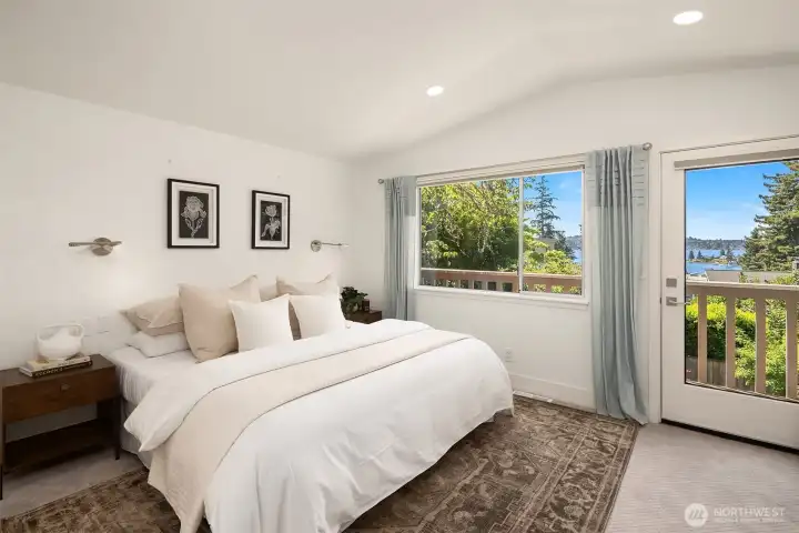 Three main-floor bedrooms suit every stage of life, with the primary suite featuring a luxurious bath and beautiful views to wake up to.