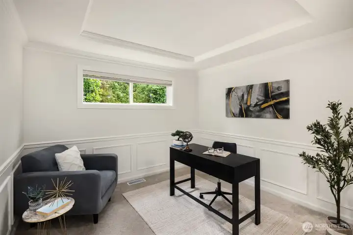 Main floor den, complete with closet, and an adjacent 3/4 bath. This is an ideal home office, but could also be used as a main floor guest suite.