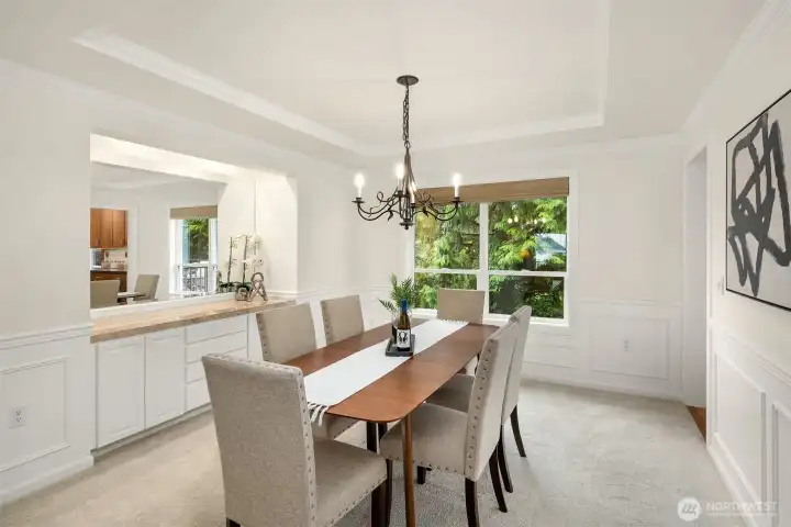 Large dining rom with built-in hutch. Additional storage and makes a great cocktail bar too!