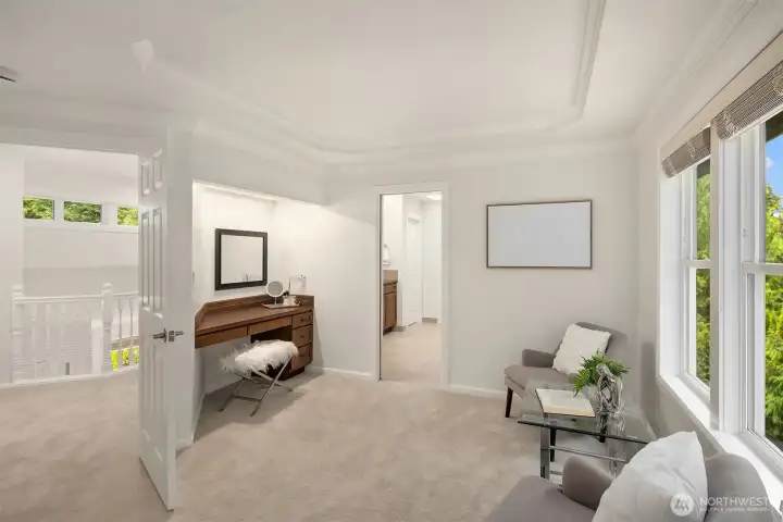 Primary suite includes both a sitting area, and a vanity - both feel like a luxury, and make this the retreat you deserve