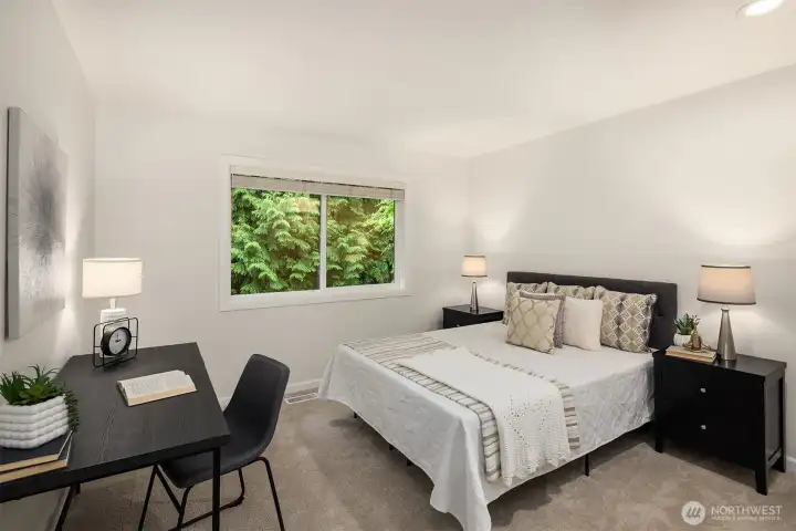 Additional secondary bedroom. Again, plenty big enough for a king bed, bedside tables and a desk.