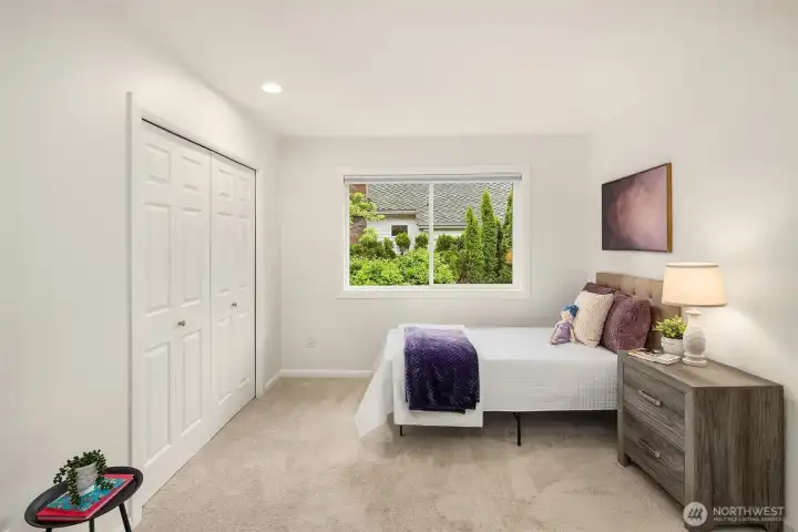 The smallest of the four bedrooms, but big enough for a full bed. Many people with this floor plan also use this space as a work out room, or additional den.