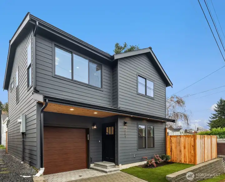 Beautifully crafted, south-facing newer construction in the heart of Magnolia offering the perfect blend of style, efficiency, and privacy. Beautifully crafted, south-facing newer construction in the heart of Magnolia offering the perfect blend of style, efficiency, and privacy.