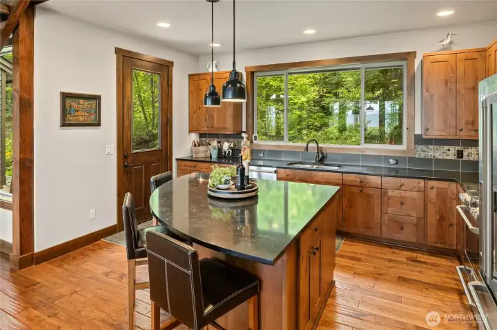 A side door off the kitchen leads to the patio on the south side of the home.