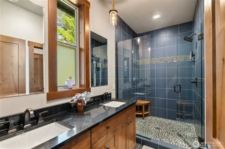 The spa-inspired ensuite bath and well-appointed layout create a true sanctuary within the home.