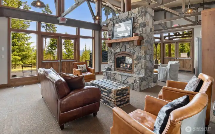 Inside the Lodge you will find additional gathering spaces...a cozy fireplace, comfortable seating areas, and a well-stocked game room.